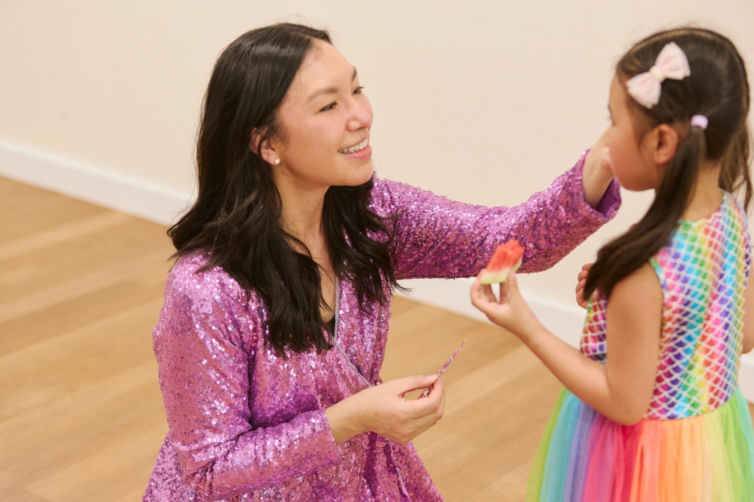 Bright Stars Dance Parties Img Children dancing and having fun at a Bright Stars Dance party with colourful lights and music.